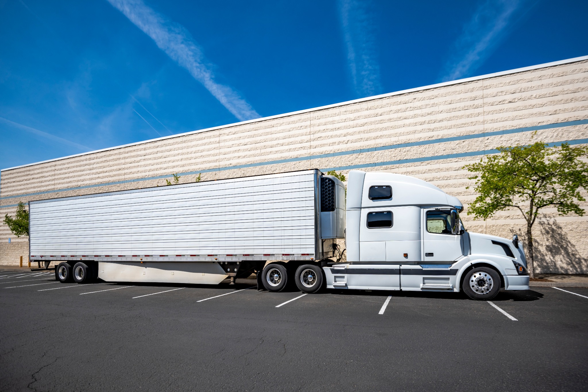 Reefer trailers parked at a warehouse